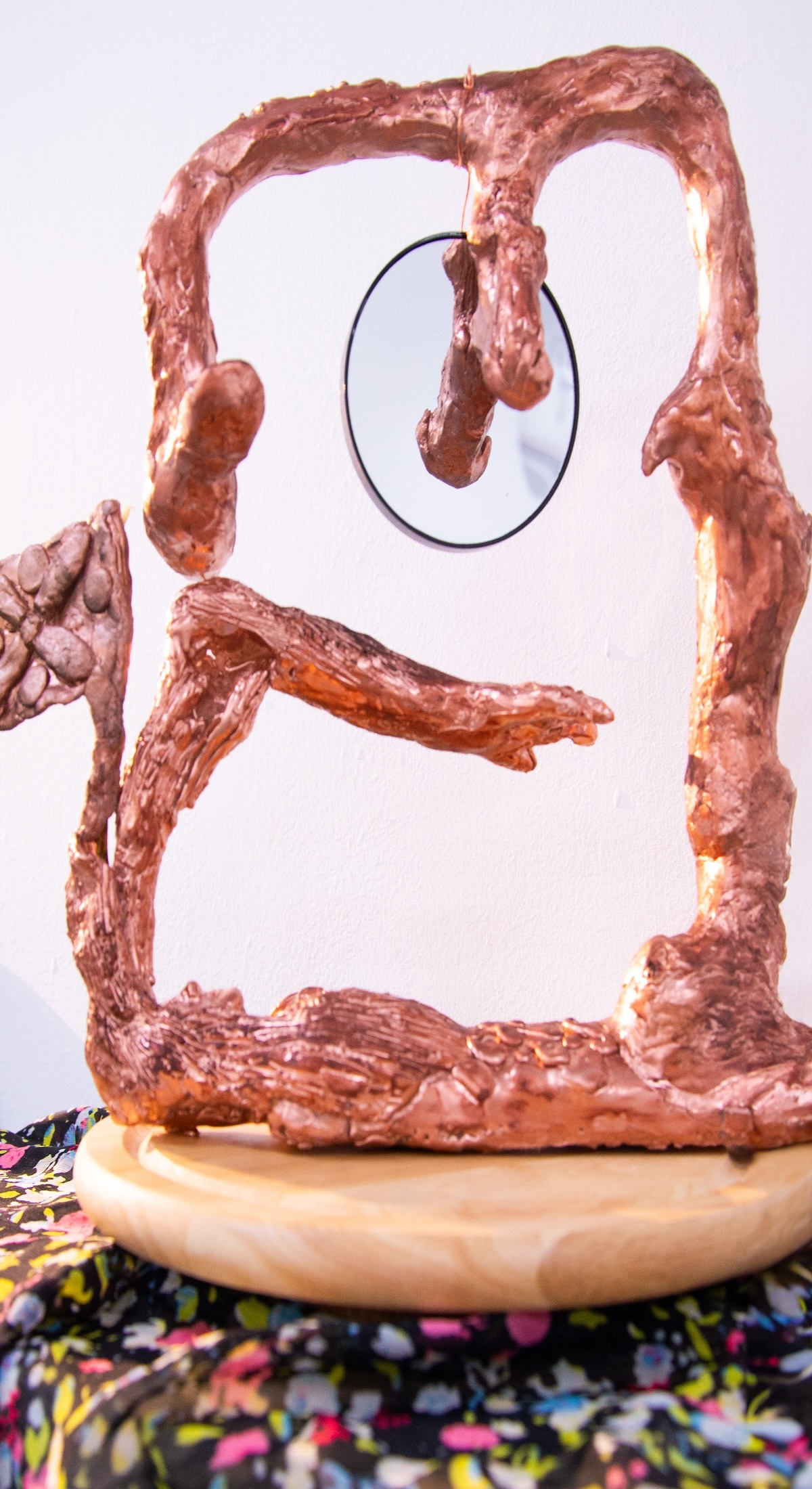 a sculpture of half woman and half man, representing the unity of people striving for a common goal.