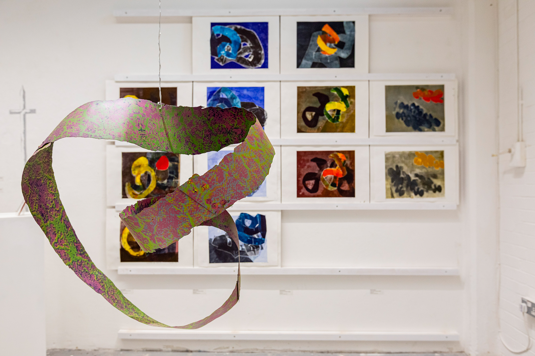 screenprinted metal sculpture and related relief monotypes exploring movement, shadow and space